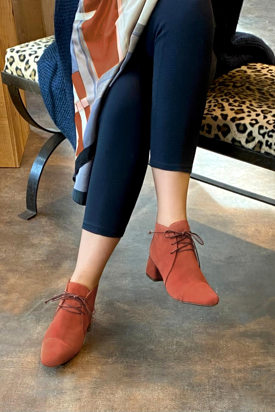 Terracotta orange women's ankle boots with laces at the front. Round toe. Low flare heels. Worn view - Florence KOOIJMAN